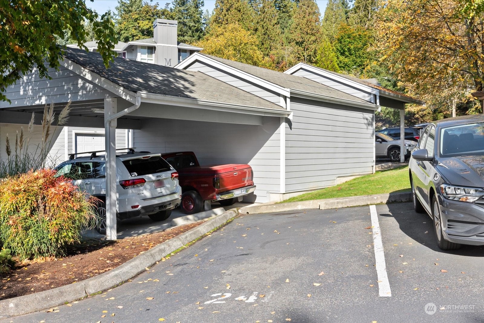 3915 243rd Place Southeast, Unit K103 Bothell, WA 98021 - Photo 26 of 36 a view of a street with cars