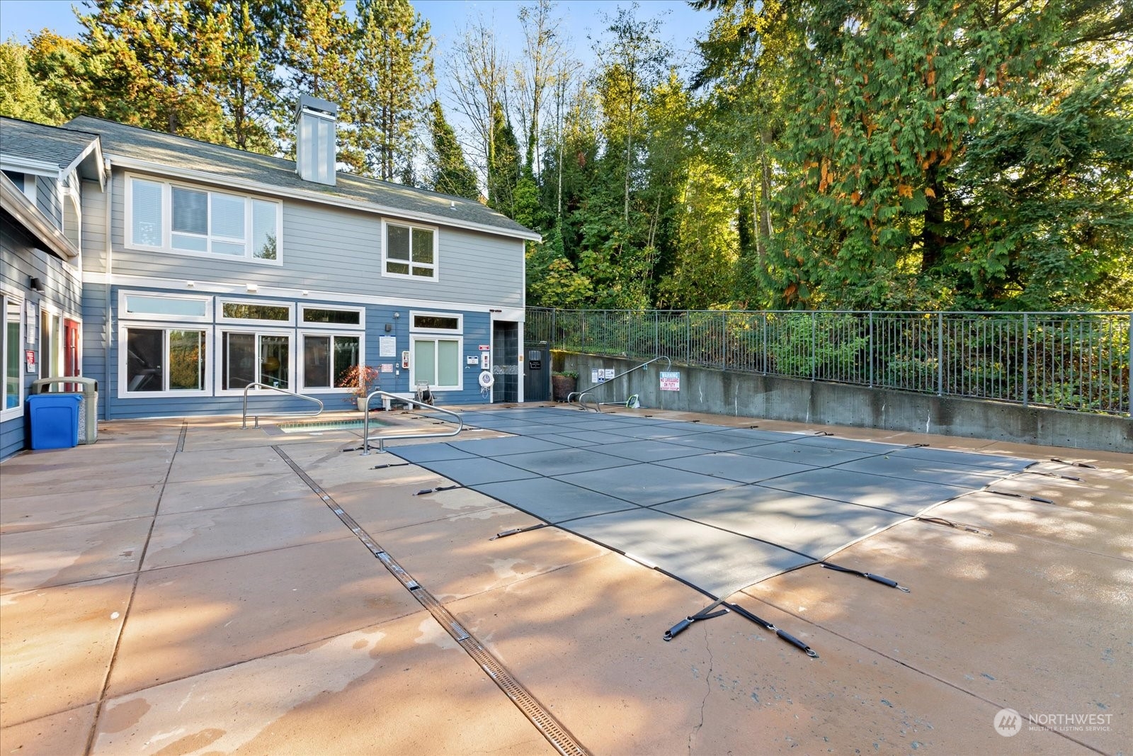 3915 243rd Place Southeast, Unit K103 Bothell, WA 98021 - Photo 27 of 36 a view of a house with a backyard