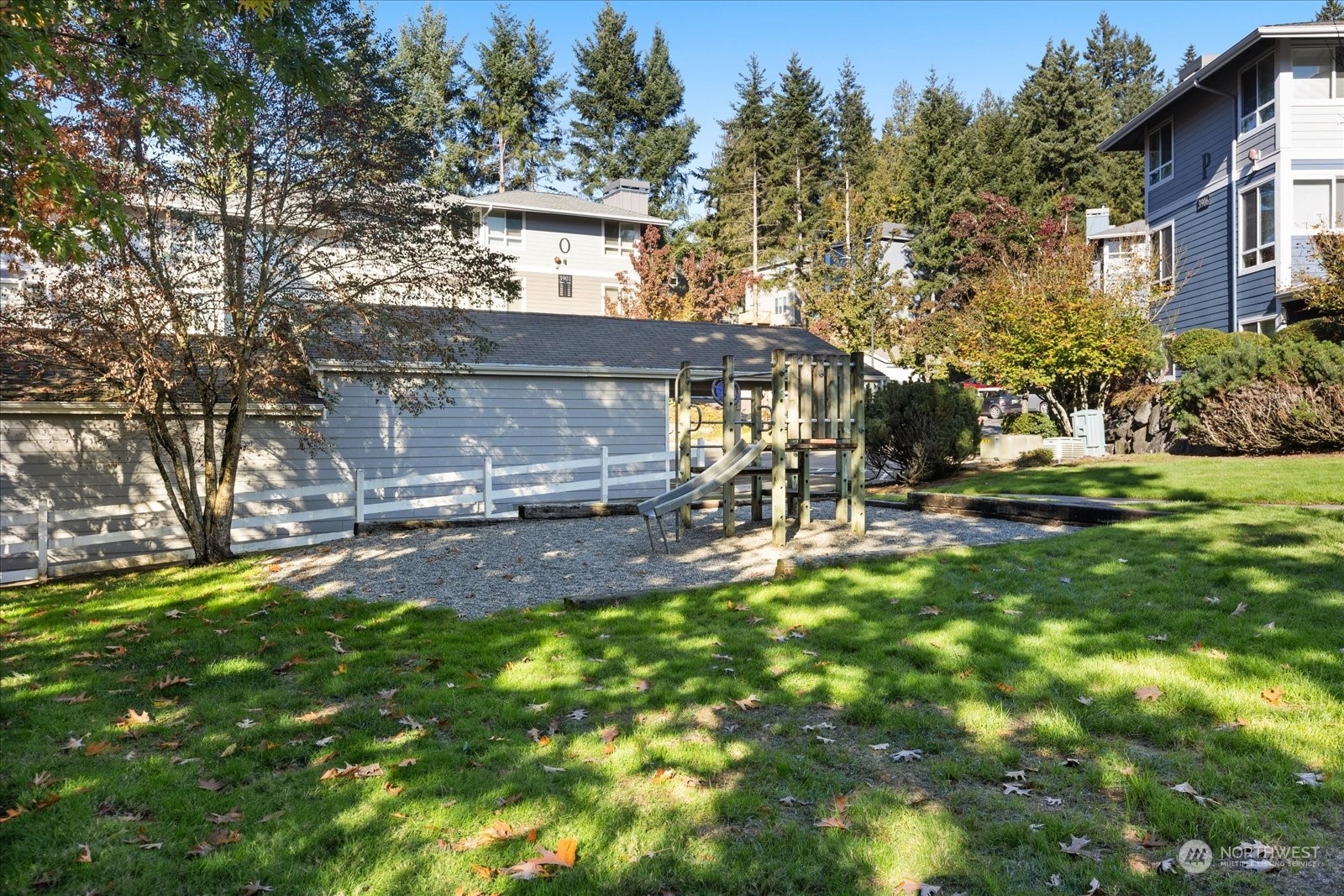 3915 243rd Place Southeast, Unit K103 Bothell, WA 98021 - Photo 36 of 36 a view of a house with a yard