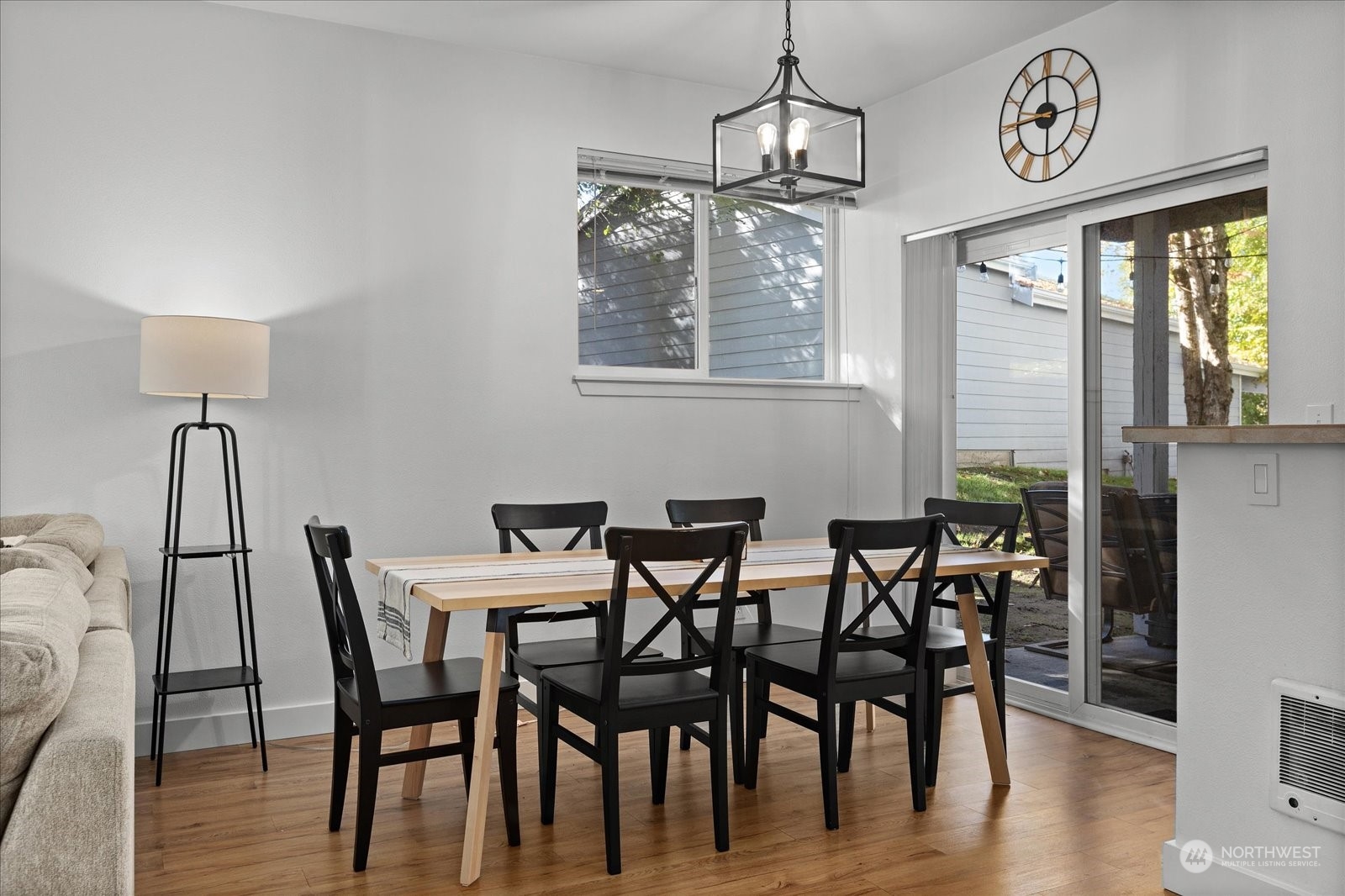 3915 243rd Place Southeast, Unit K103 Bothell, WA 98021 - Photo 7 of 36 a view of a dining room with furniture window and wooden floor