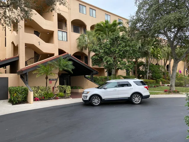a car parked in front of a house