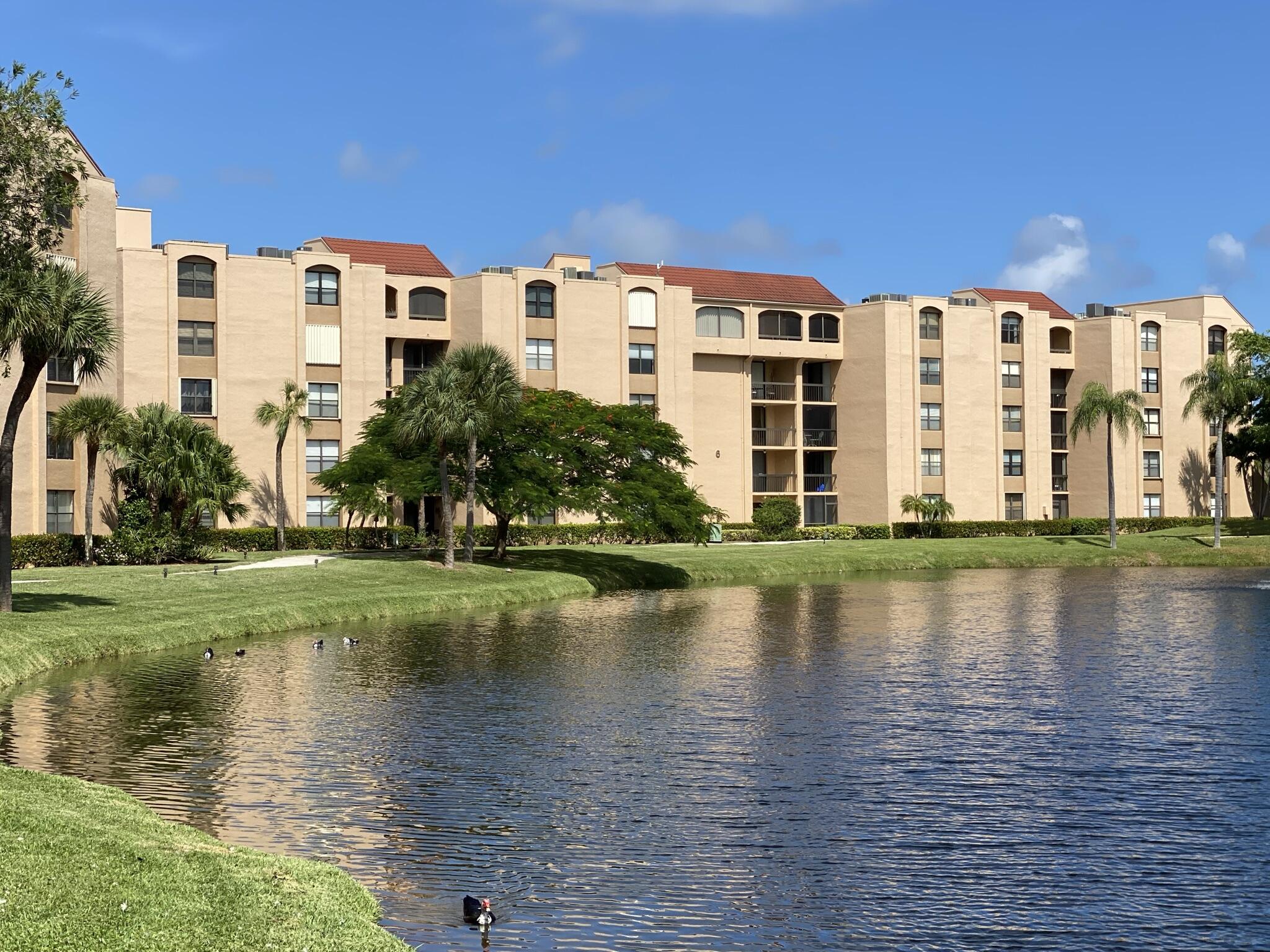 755 Dotterel Road, Unit 1108 Delray Beach, FL 33444 - Photo 3 of 28 a view of a building with lake view