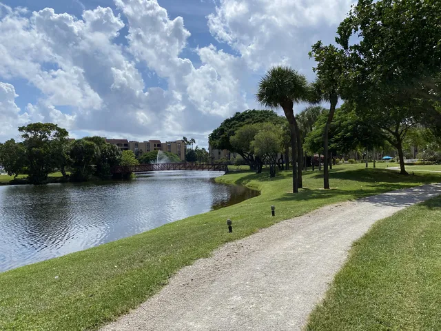 a view of lake with green space