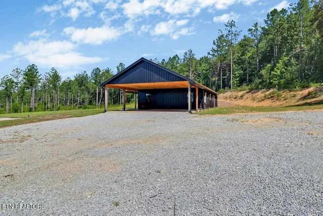 a house with trees in the background