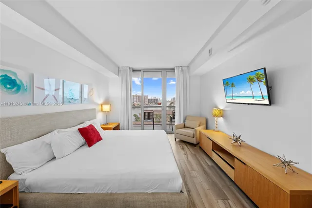 a bed room with a bed and a large window