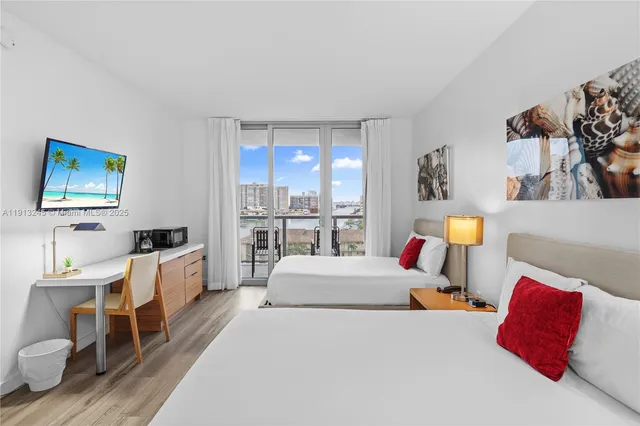 a bathroom with a sink mirror and toilet