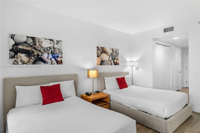 a view of a swimming pool with outdoor seating