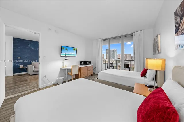 a view of a swimming pool with sitting area