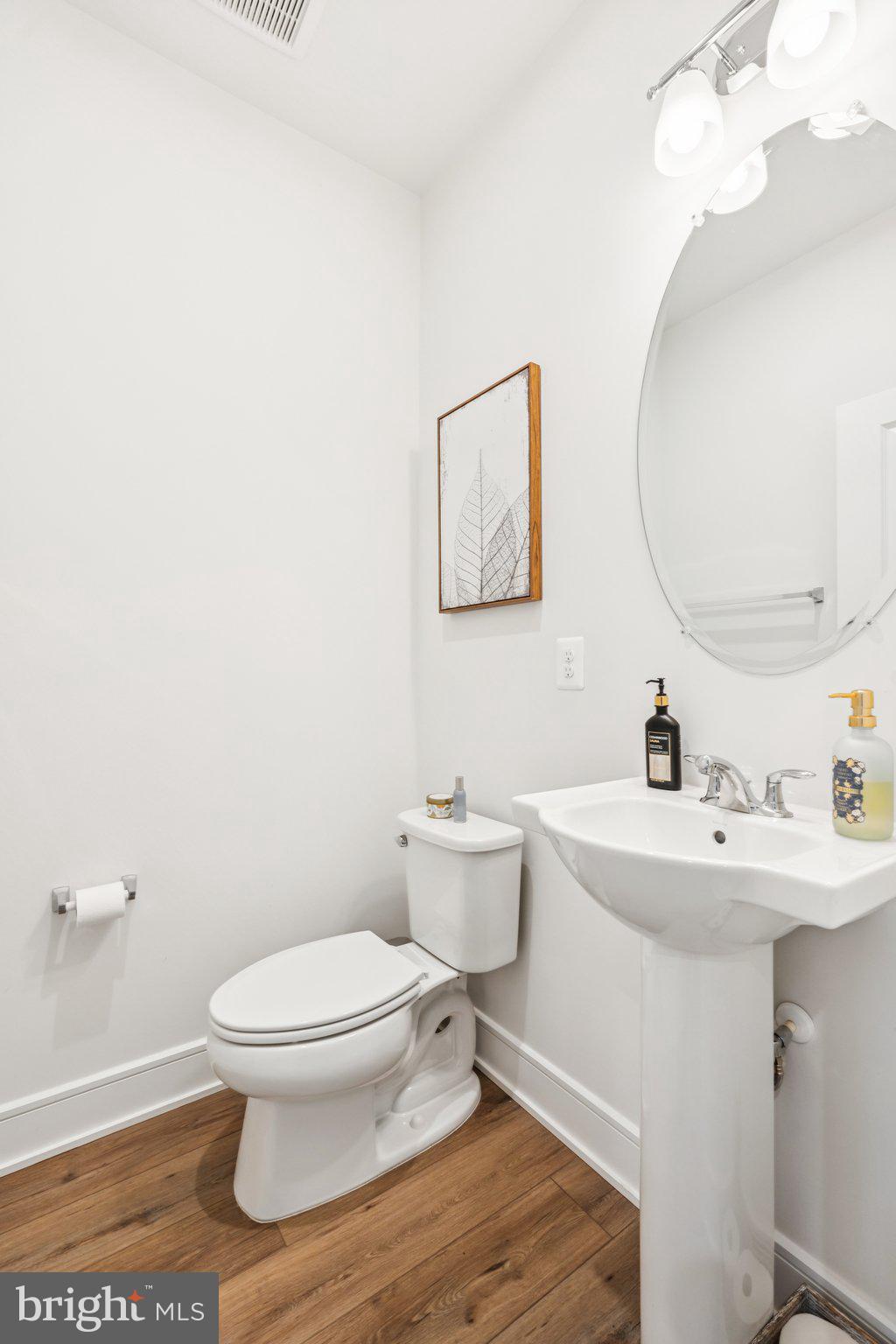 3580 Stephensons Hl Lane Marshall, VA 20115 - Photo 14 of 41 a bathroom with a toilet a sink and mirror