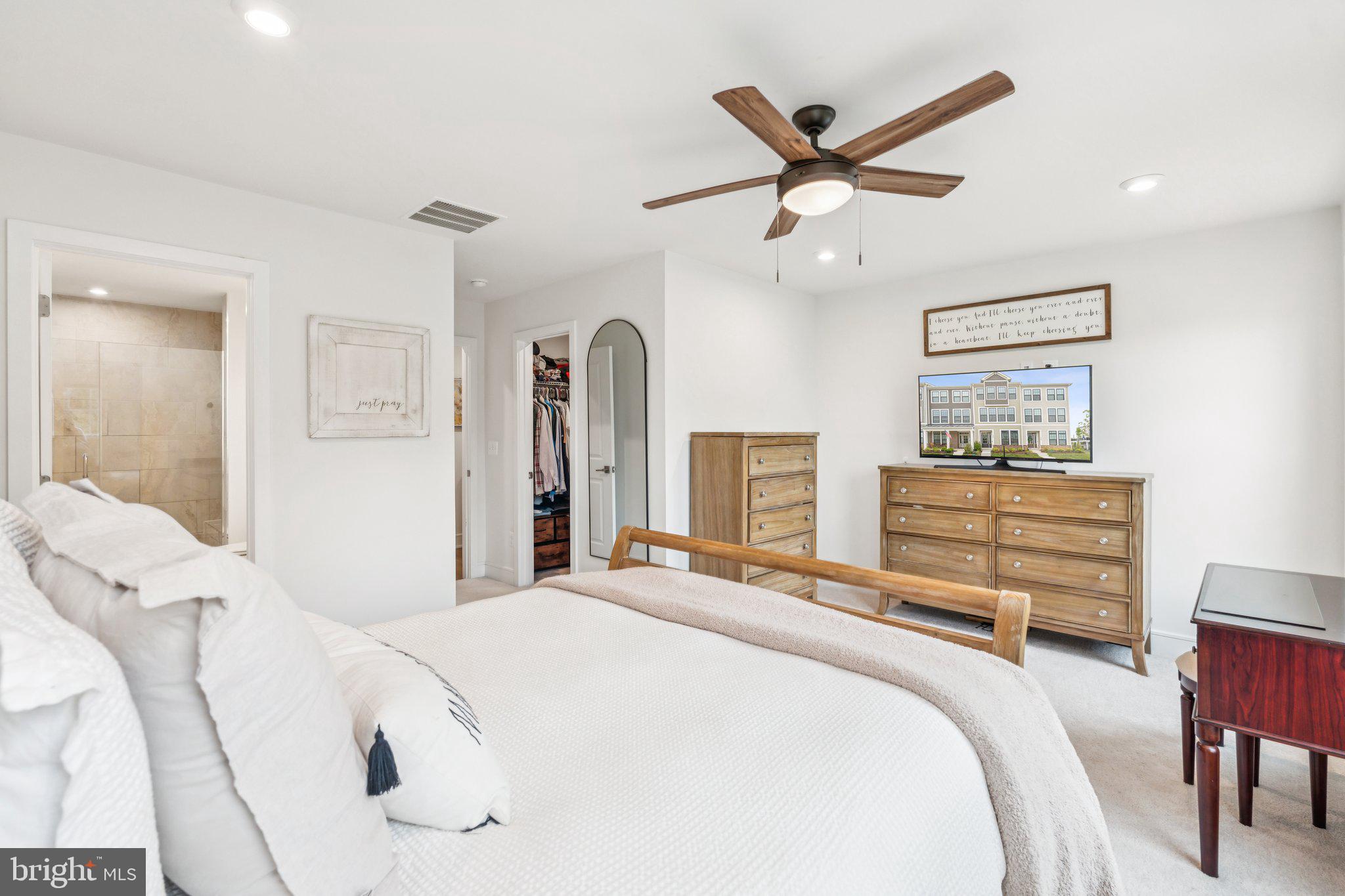 3580 Stephensons Hl Lane Marshall, VA 20115 - Photo 22 of 41 a bedroom with a large bed and a ceiling fan