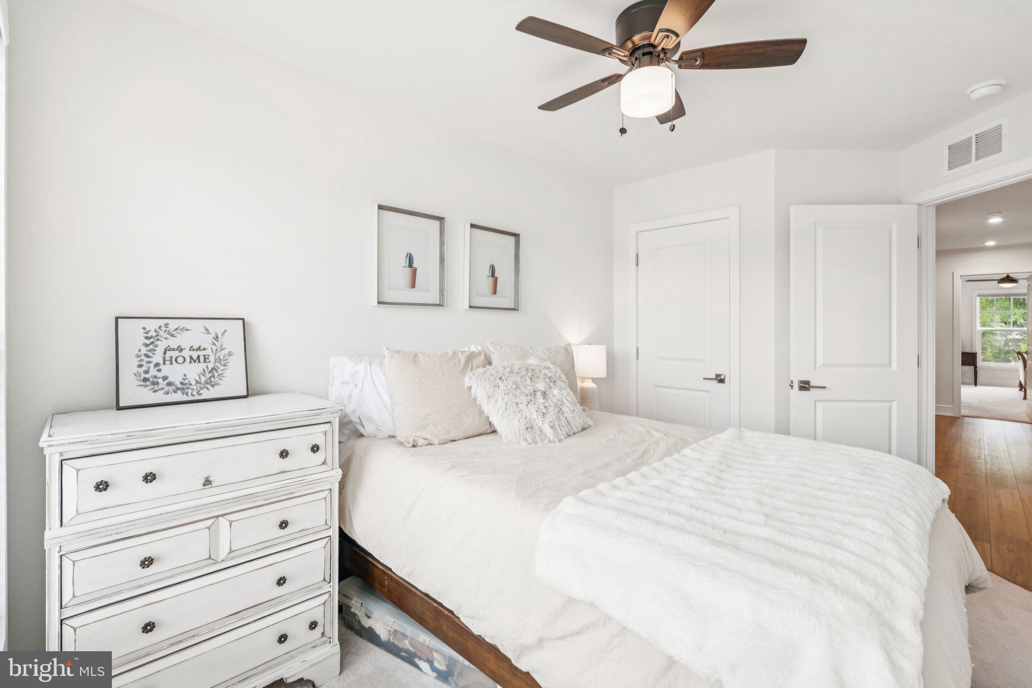 3580 Stephensons Hl Lane Marshall, VA 20115 - Photo 26 of 41 a bedroom with a bed and a chandelier