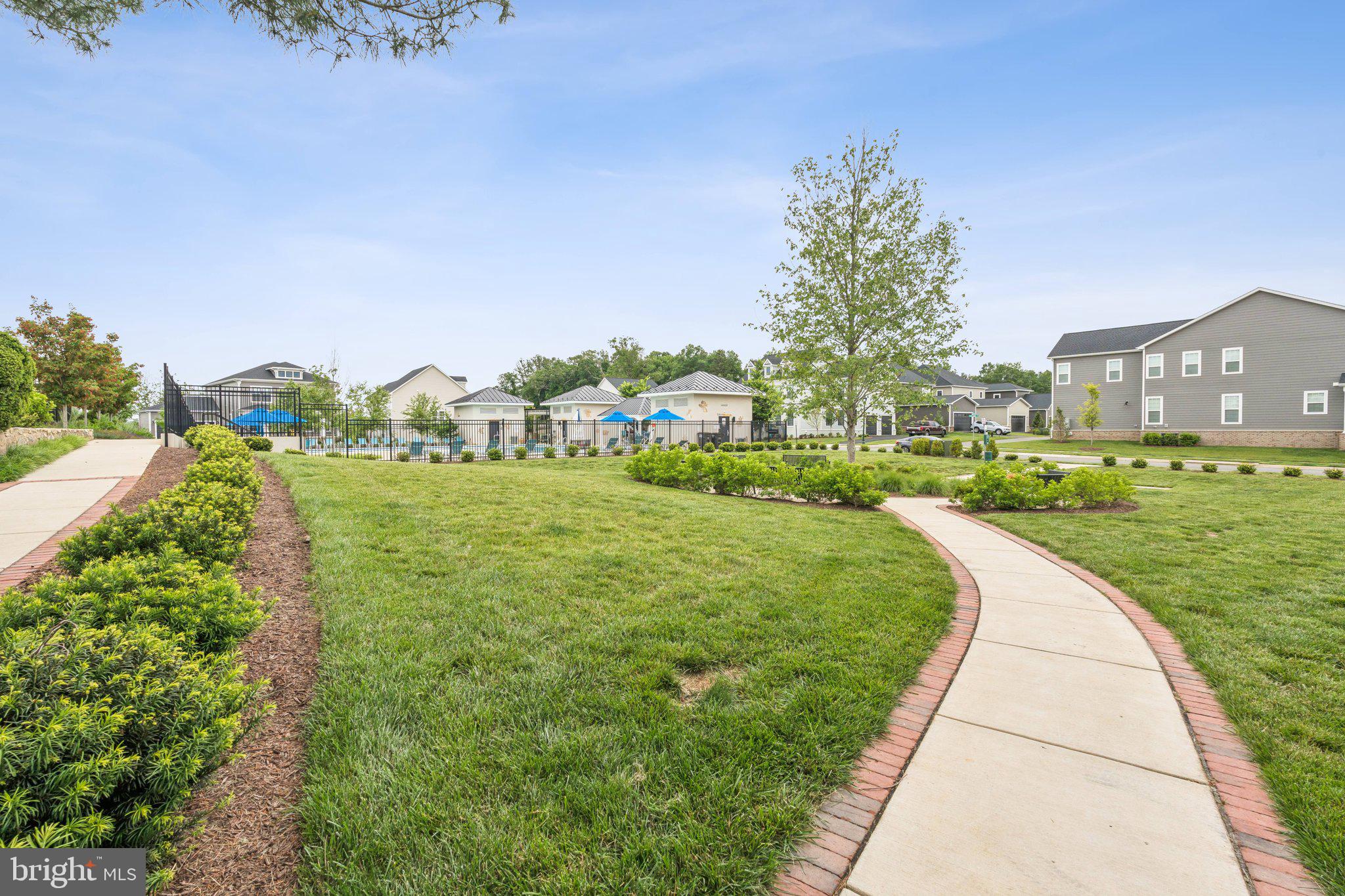 3580 Stephensons Hl Lane Marshall, VA 20115 - Photo 40 of 41 a view of a garden with a building in the background