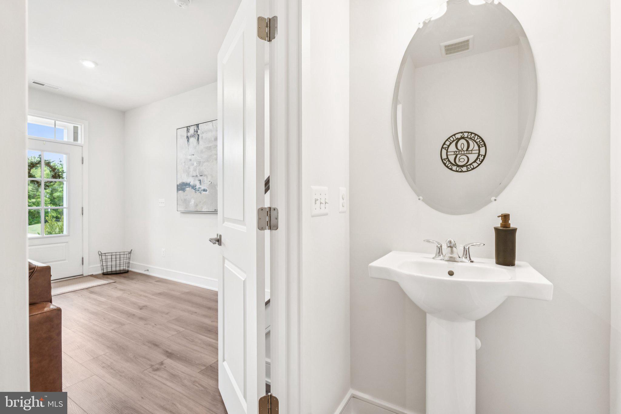 3580 Stephensons Hl Lane Marshall, VA 20115 - Photo 5 of 41 a bathroom with a sink a mirror and a shower