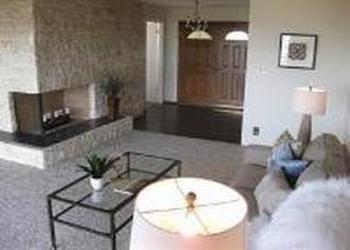 1240 Lasuen Drive Millbrae, CA 94030 - Photo 5 of 12 a living room with furniture and a fireplace