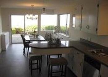1240 Lasuen Drive Millbrae, CA 94030 - Photo 6 of 12 a view of a dining room with furniture and wooden floor