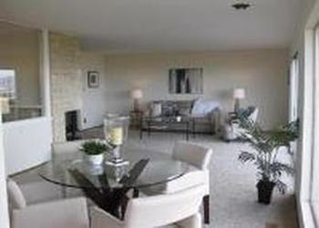 1240 Lasuen Drive Millbrae, CA 94030 - Photo 8 of 12 a living room with furniture and a table