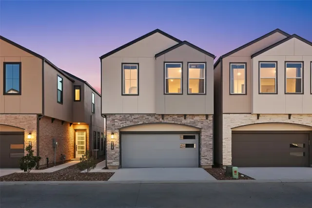 a front view of a house with yard