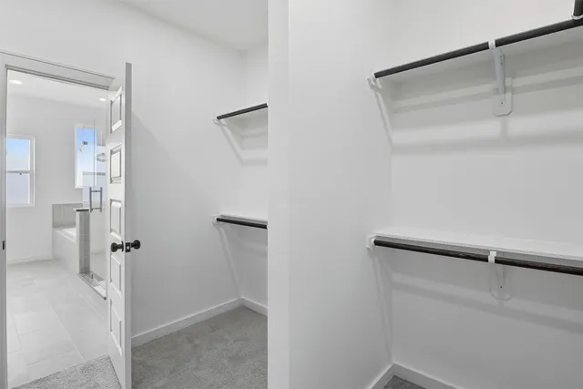 a view of a room with racks on the wall