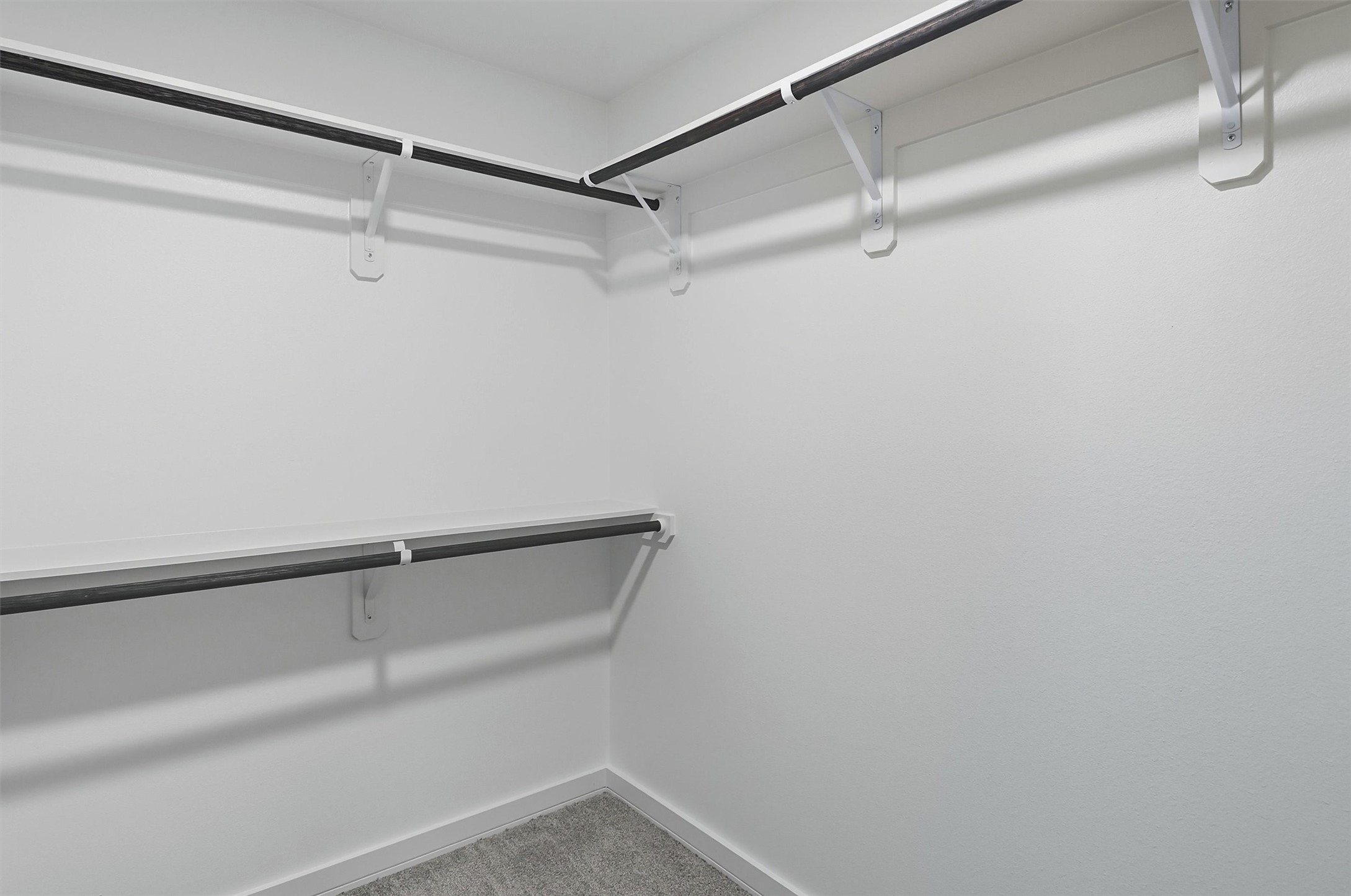 2927 El Fenice Lane Houston, TX 77057 - Photo 41 of 47 a view of a room with racks on the wall