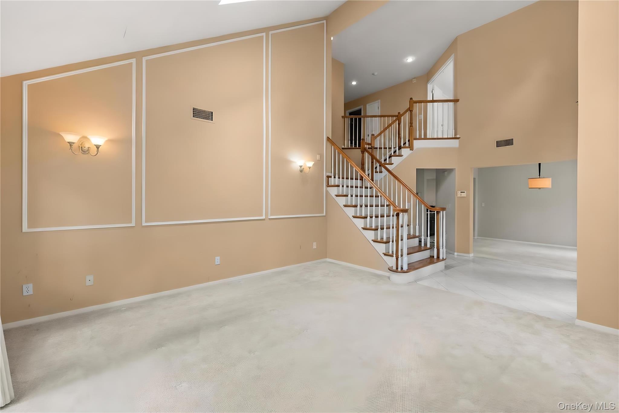 34 Cedar Ridge Lane Bay Shore, NY 11706 - Photo 8 of 27 a view of an entryway with staircase