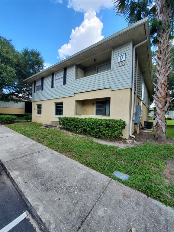a view of a yard in front of a house