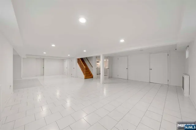 a view of a storage & utility room with wooden floor