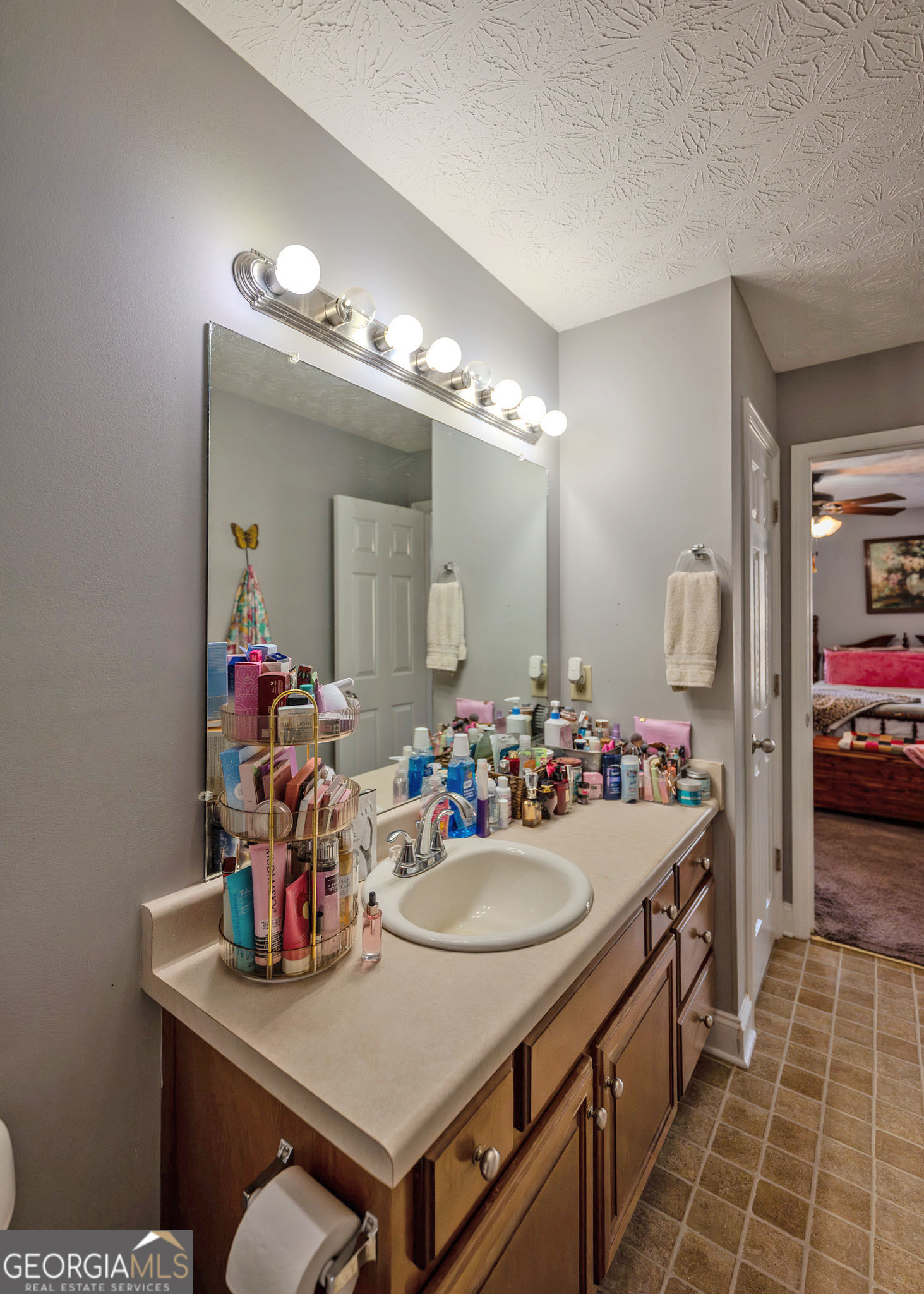 1363 McFarlin Bridge Road Carnesville, GA 30521 - Photo 20 of 78 a bathroom with a sink double vanity and a mirror