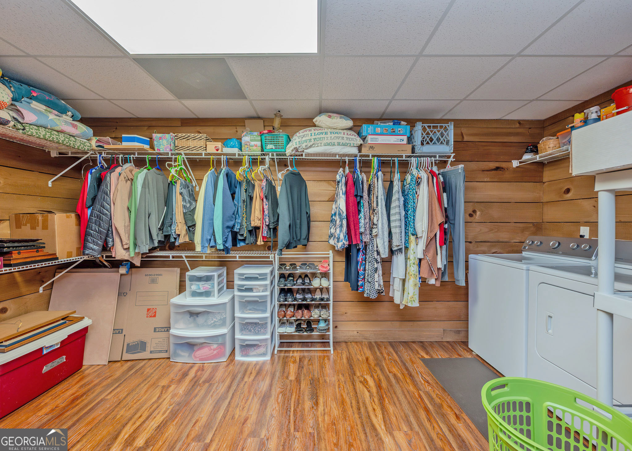 1363 McFarlin Bridge Road Carnesville, GA 30521 - Photo 38 of 78 a view of walk in closet with clothes and shoes