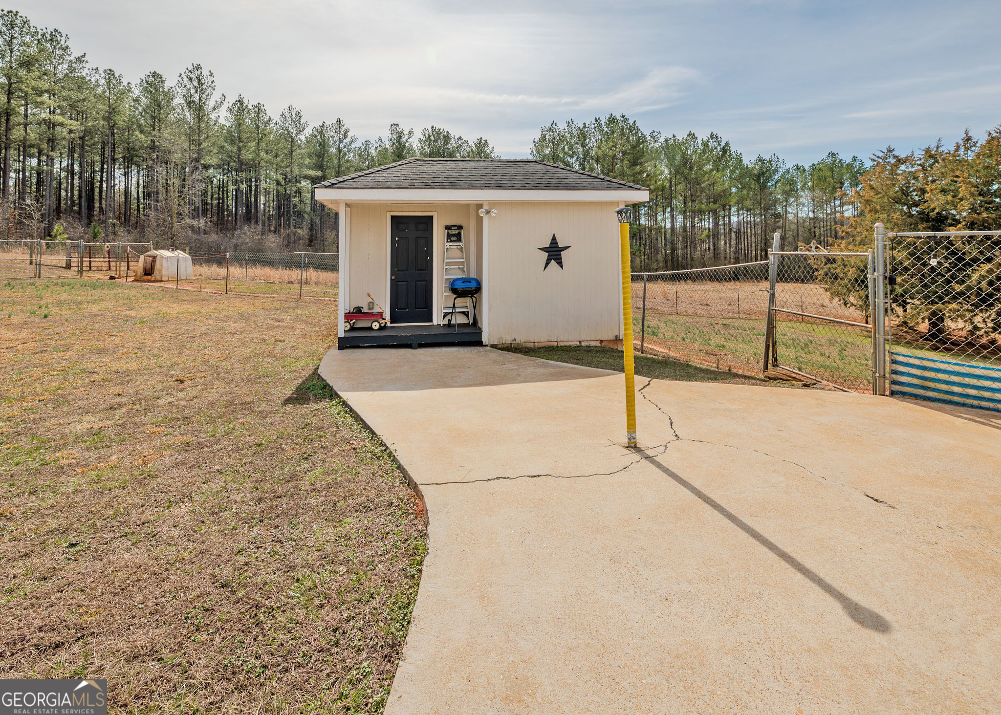 1363 McFarlin Bridge Road Carnesville, GA 30521 - Photo 40 of 78 a view of a house with backyard