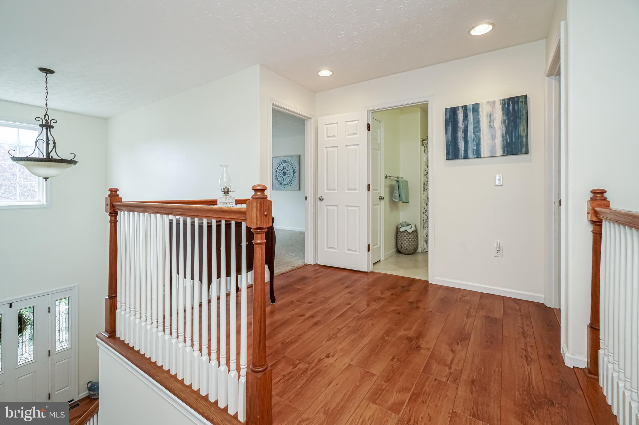 66 Jesse Boyd Circle Elkton, MD 21921 - Photo 15 of 29 Upstairs landing and cathedral ceiling