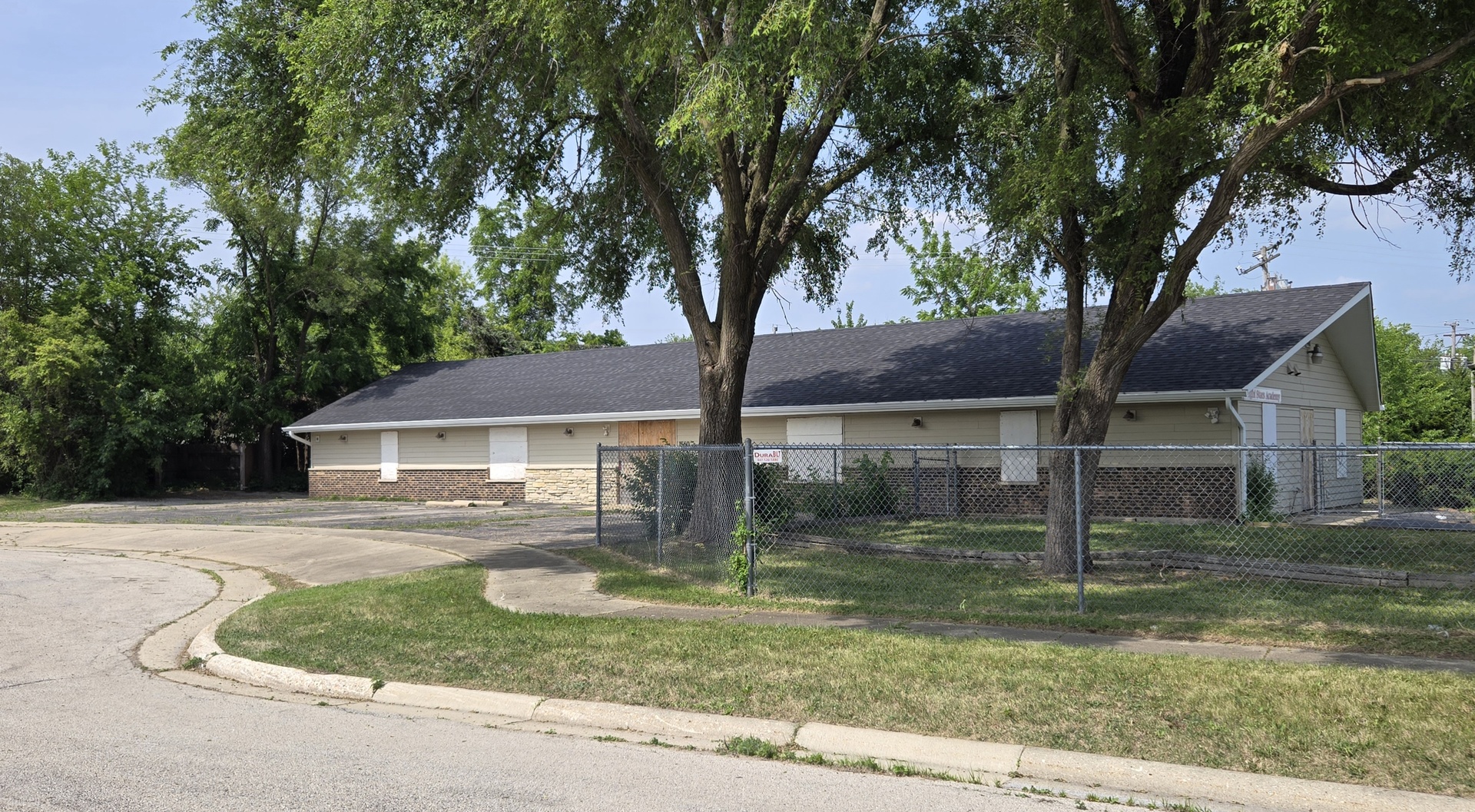1560 Weatherstone Lane Elgin, IL 60123 - Photo 4 of 4 front view of a house with a yard