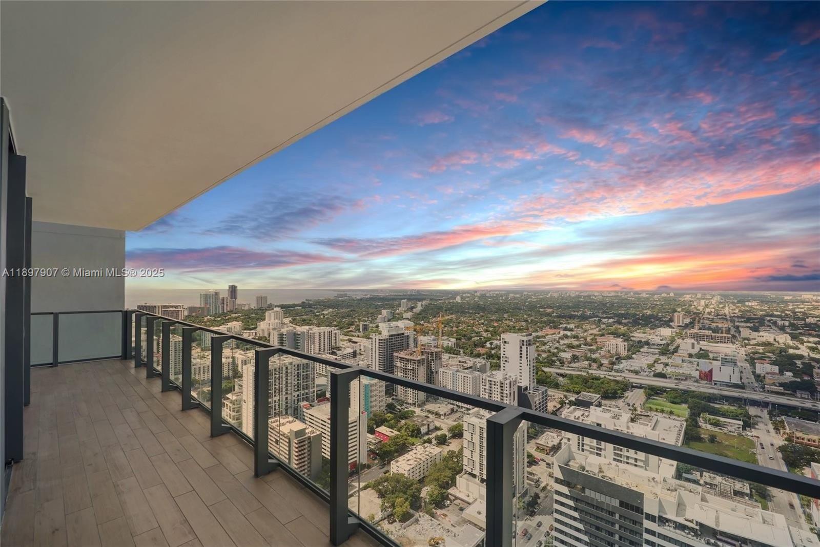 88 Southwest 7th Street, Unit 3910 Miami, FL 33130 - Photo 2 of 38 a view of city from balcony