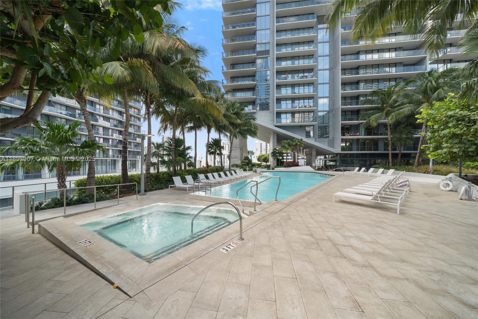 88 Southwest 7th Street, Unit 3910 Miami, FL 33130 - Photo 30 of 38 a view of outdoor space with swimming pool and patio
