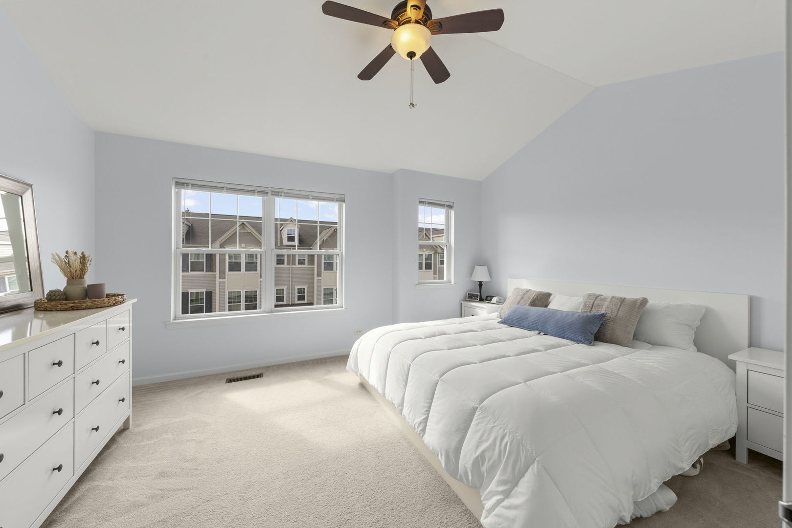 341 North Commerce Street Aurora, IL 60504 - Photo 11 of 26 a bedroom with a bed and window