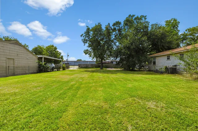 a view of swimming pool with an outdoor seating