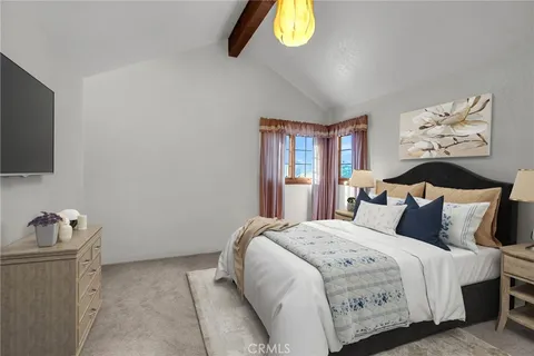a kitchen with a sink dishwasher stove and cabinets