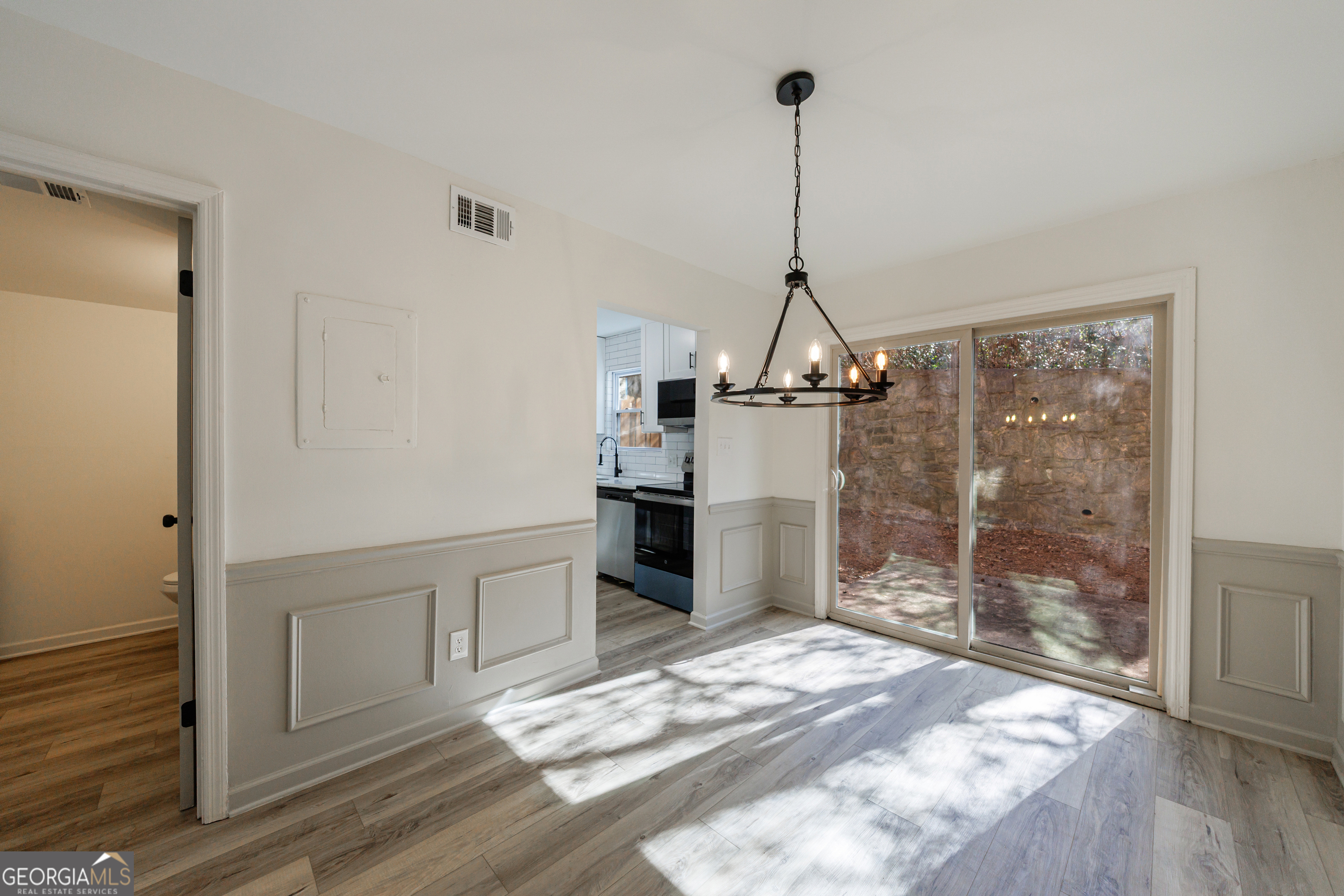 2386 Lawrenceville Highway Decatur, GA 30033 - Photo 12 of 55 a very nice looking room with a wooden floor and a fireplace