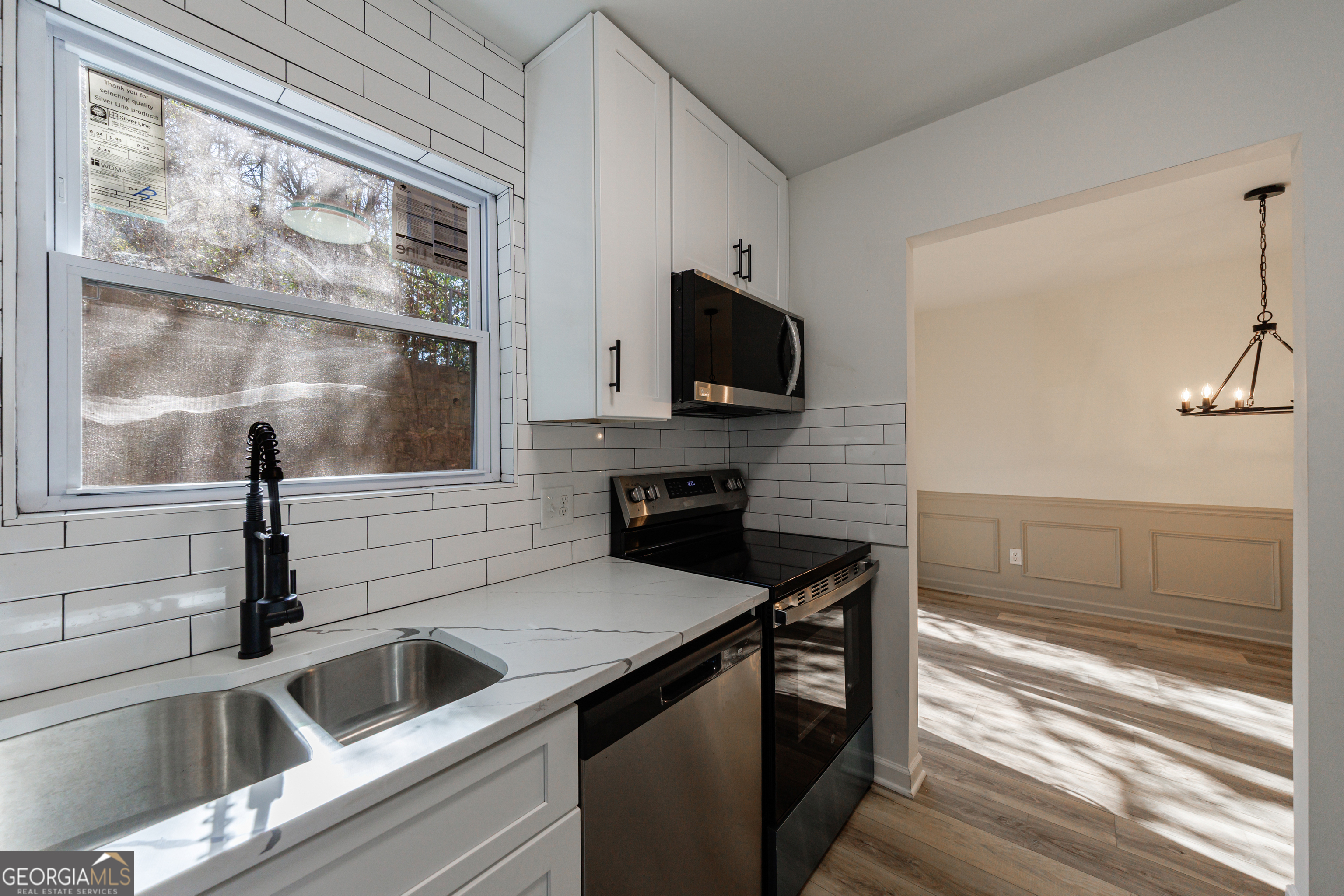 2386 Lawrenceville Highway Decatur, GA 30033 - Photo 18 of 55 a kitchen with a sink and a refrigerator