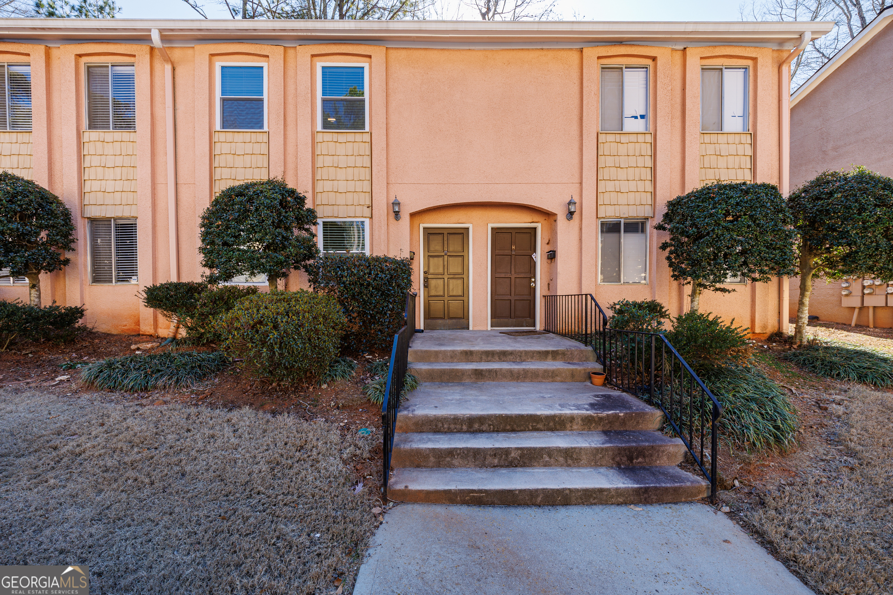 2386 Lawrenceville Highway Decatur, GA 30033 - Photo 2 of 55 a front view of a house with plants and entryway