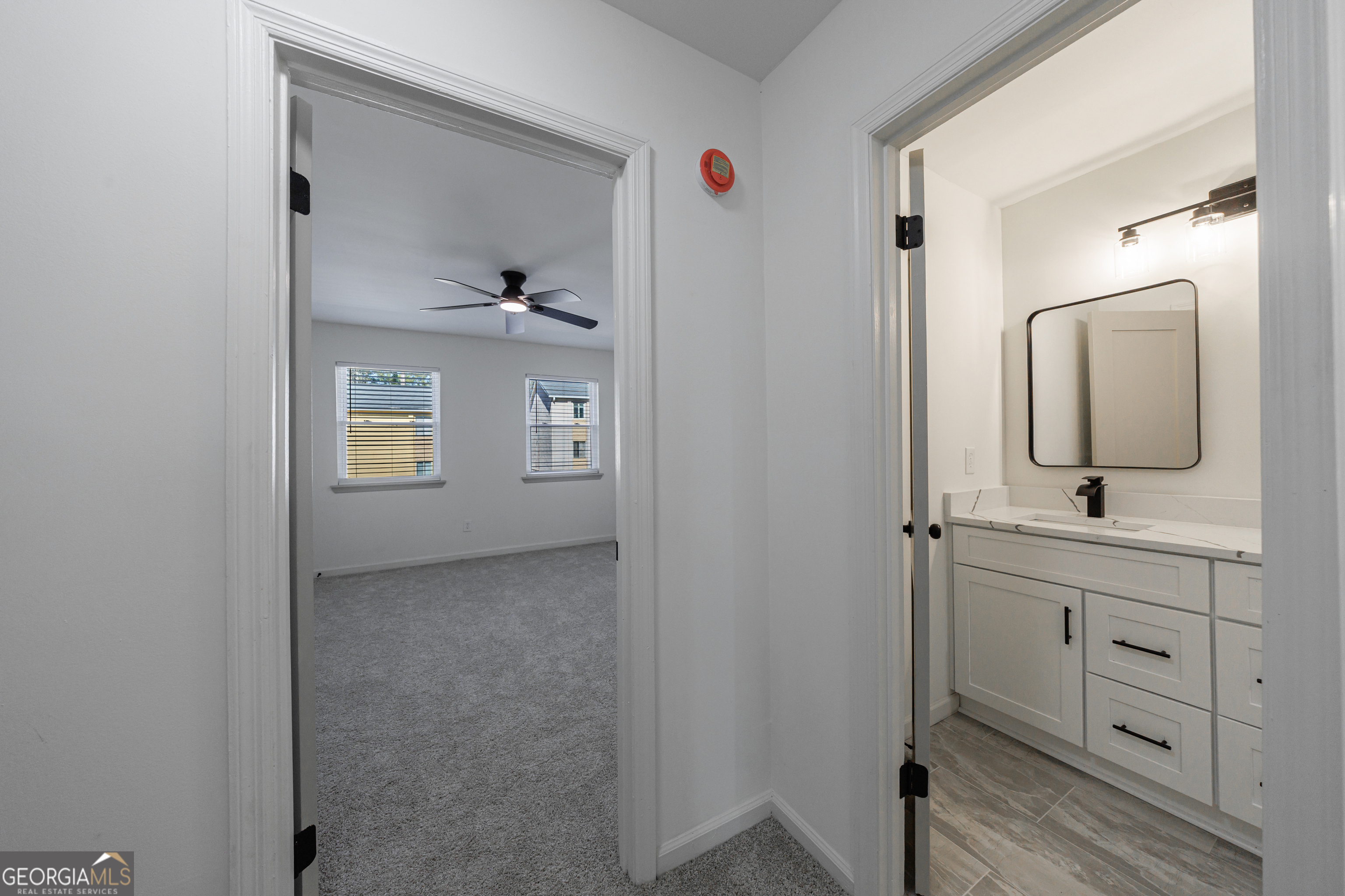 2386 Lawrenceville Highway Decatur, GA 30033 - Photo 33 of 55 a bathroom with a toilet sink and mirror