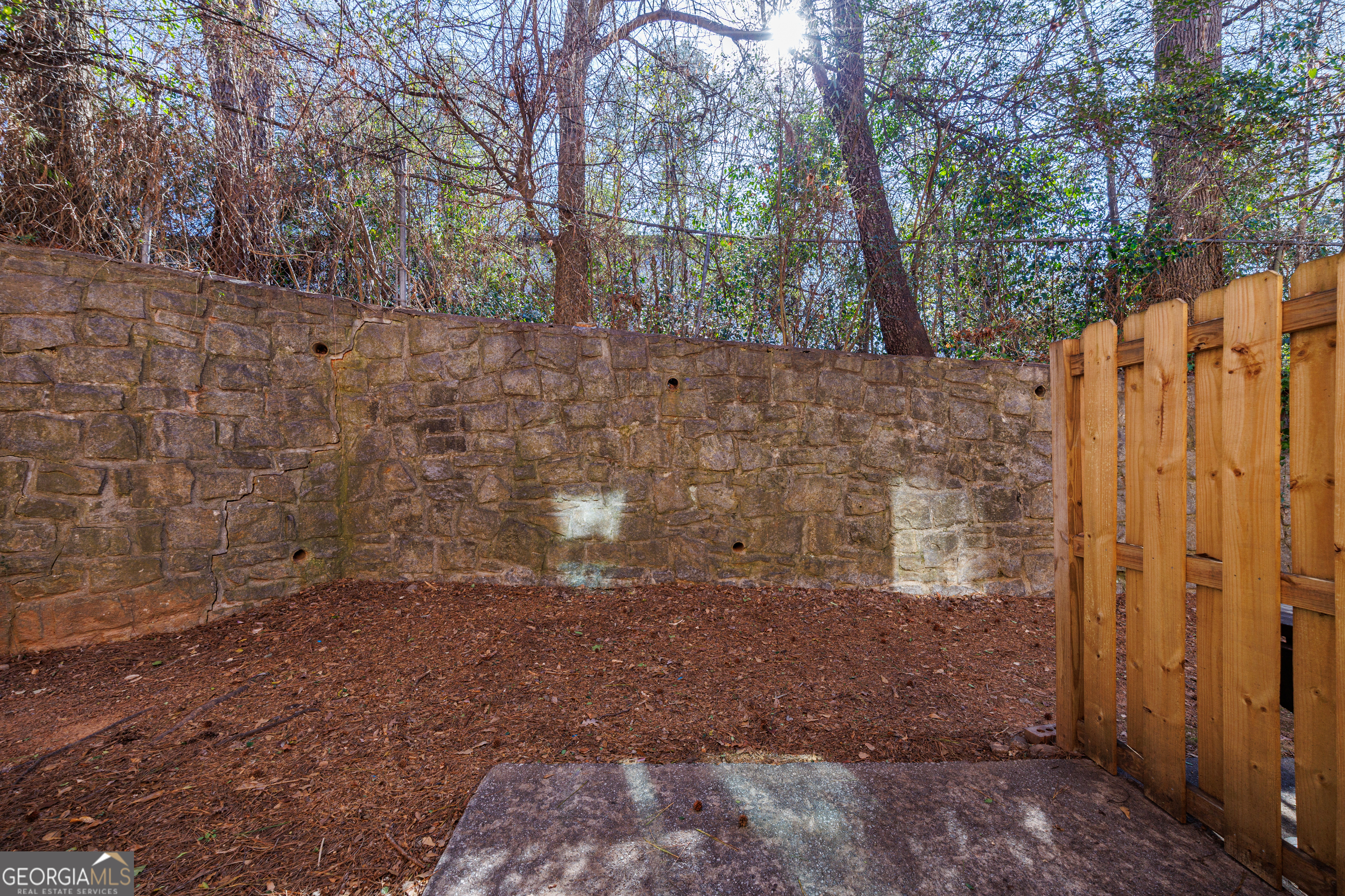 2386 Lawrenceville Highway Decatur, GA 30033 - Photo 37 of 55 a view of a yard with trees in front of it