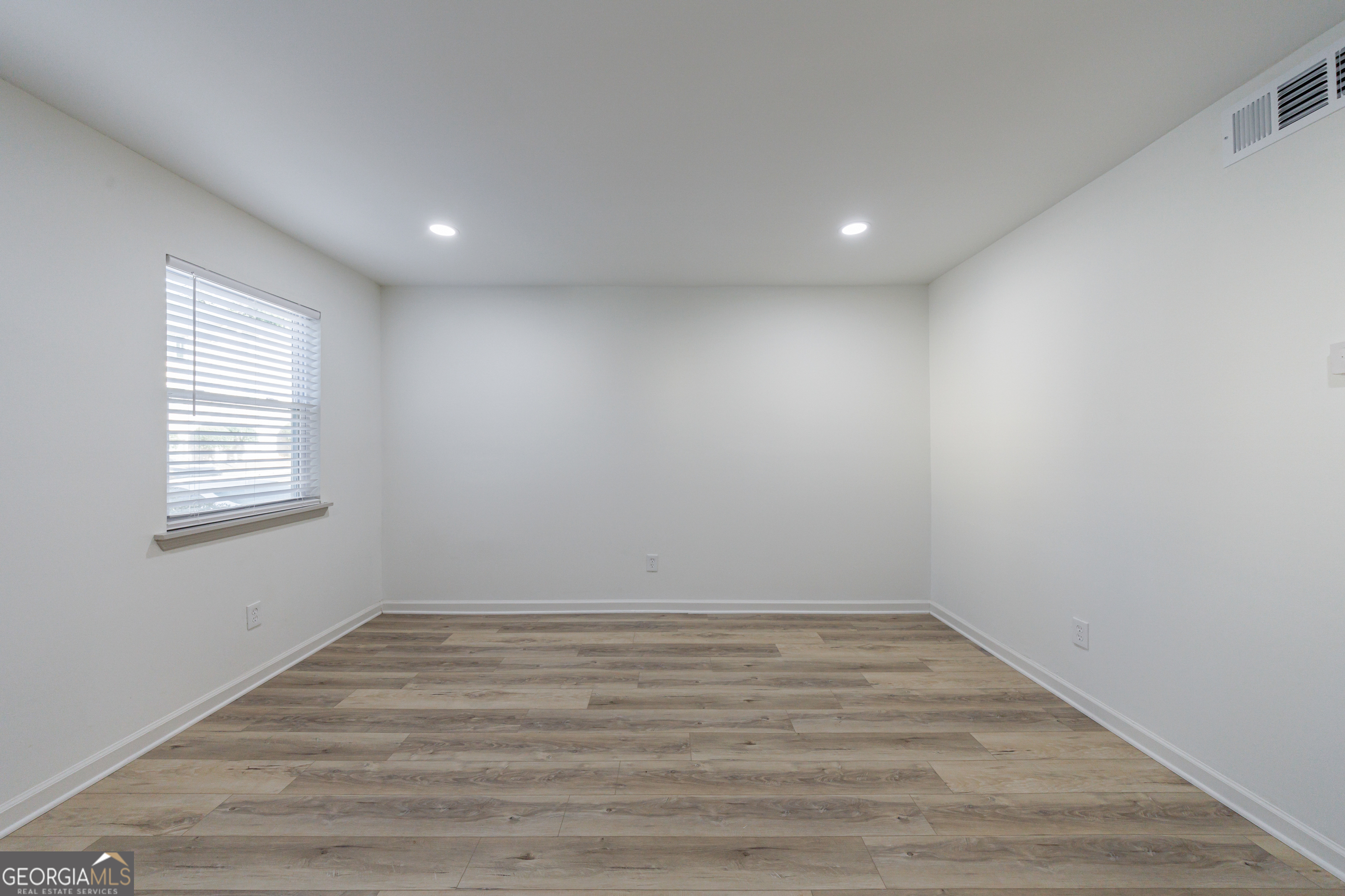 2386 Lawrenceville Highway Decatur, GA 30033 - Photo 7 of 55 a view of room with window and wooden floor
