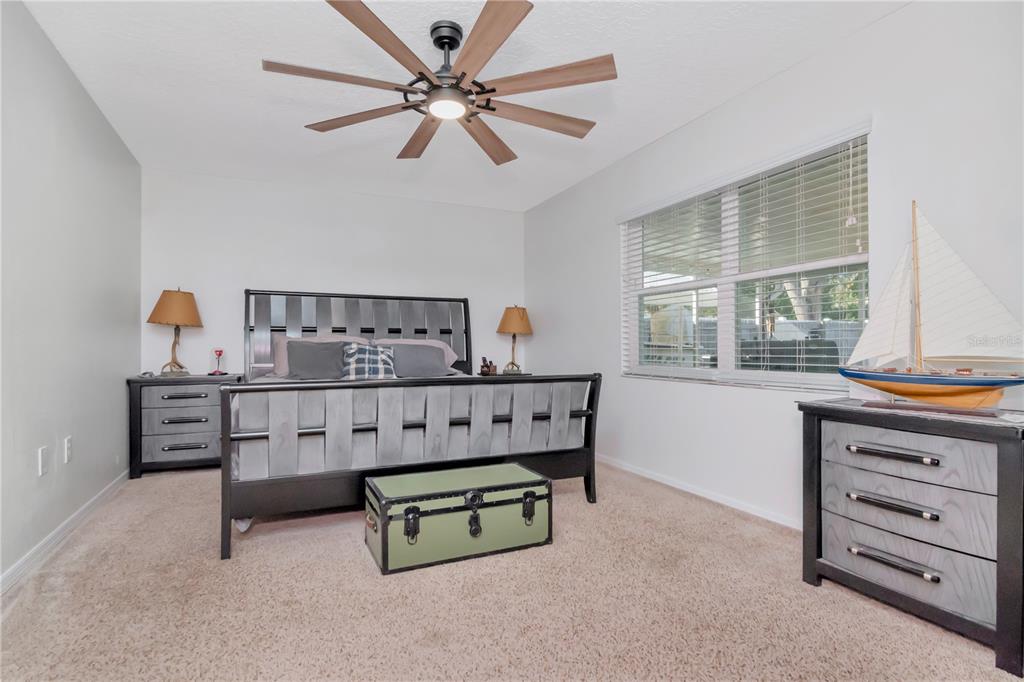 9791 Horizon Drive Spring Hill, FL 34608 - Photo 24 of 38 a bedroom with furniture and a window