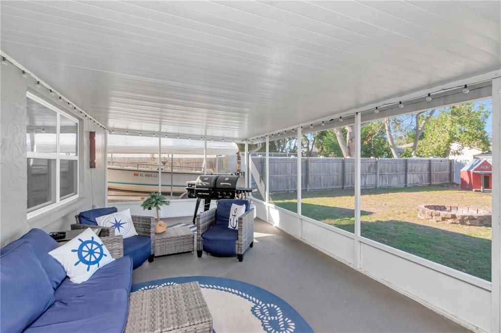 9791 Horizon Drive Spring Hill, FL 34608 - Photo 27 of 38 a living room with furniture and a table