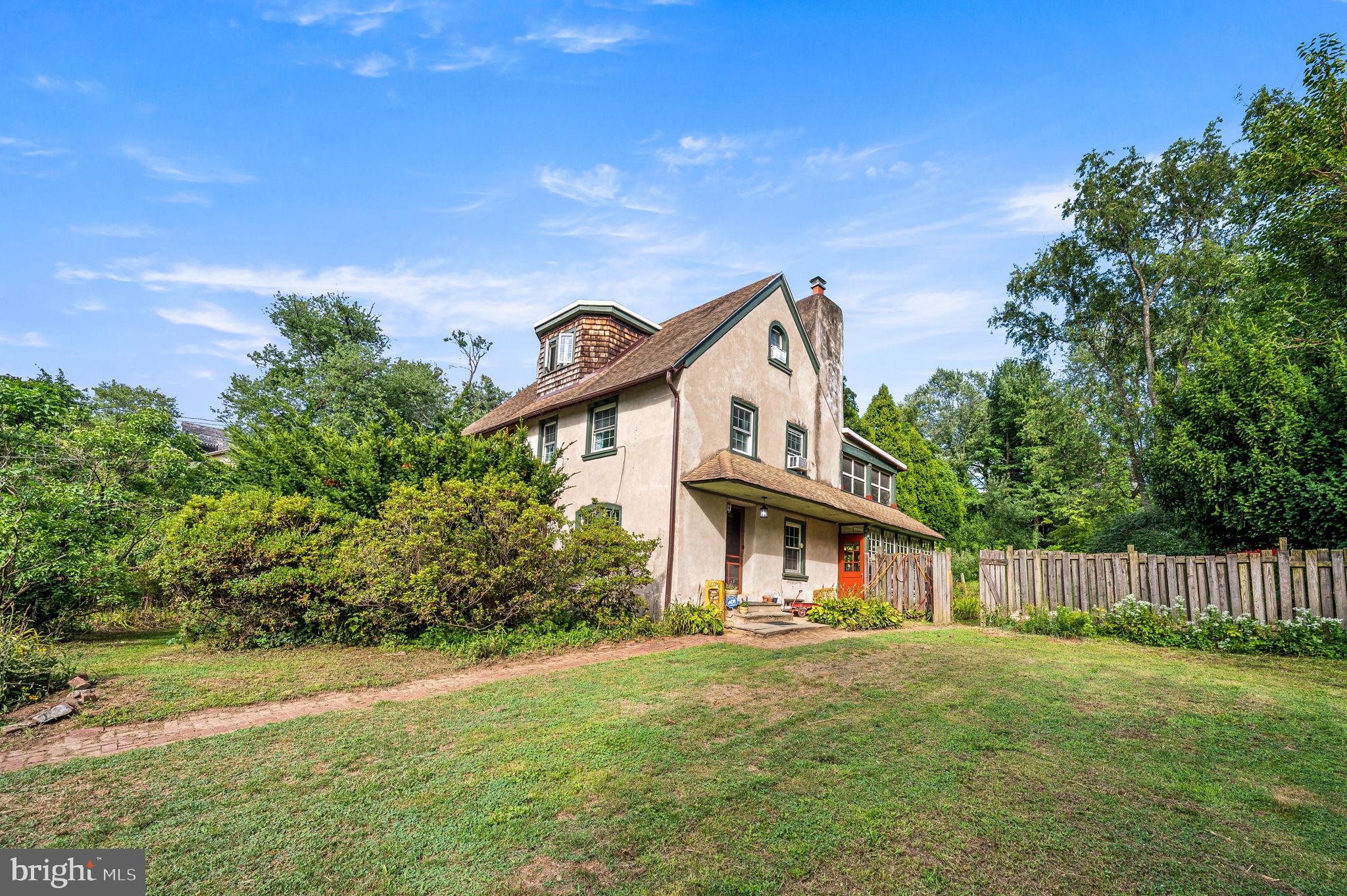 408 East Woodlawn Street Philadelphia, PA 19144 - Photo 1 of 31 front view of a house with a yard