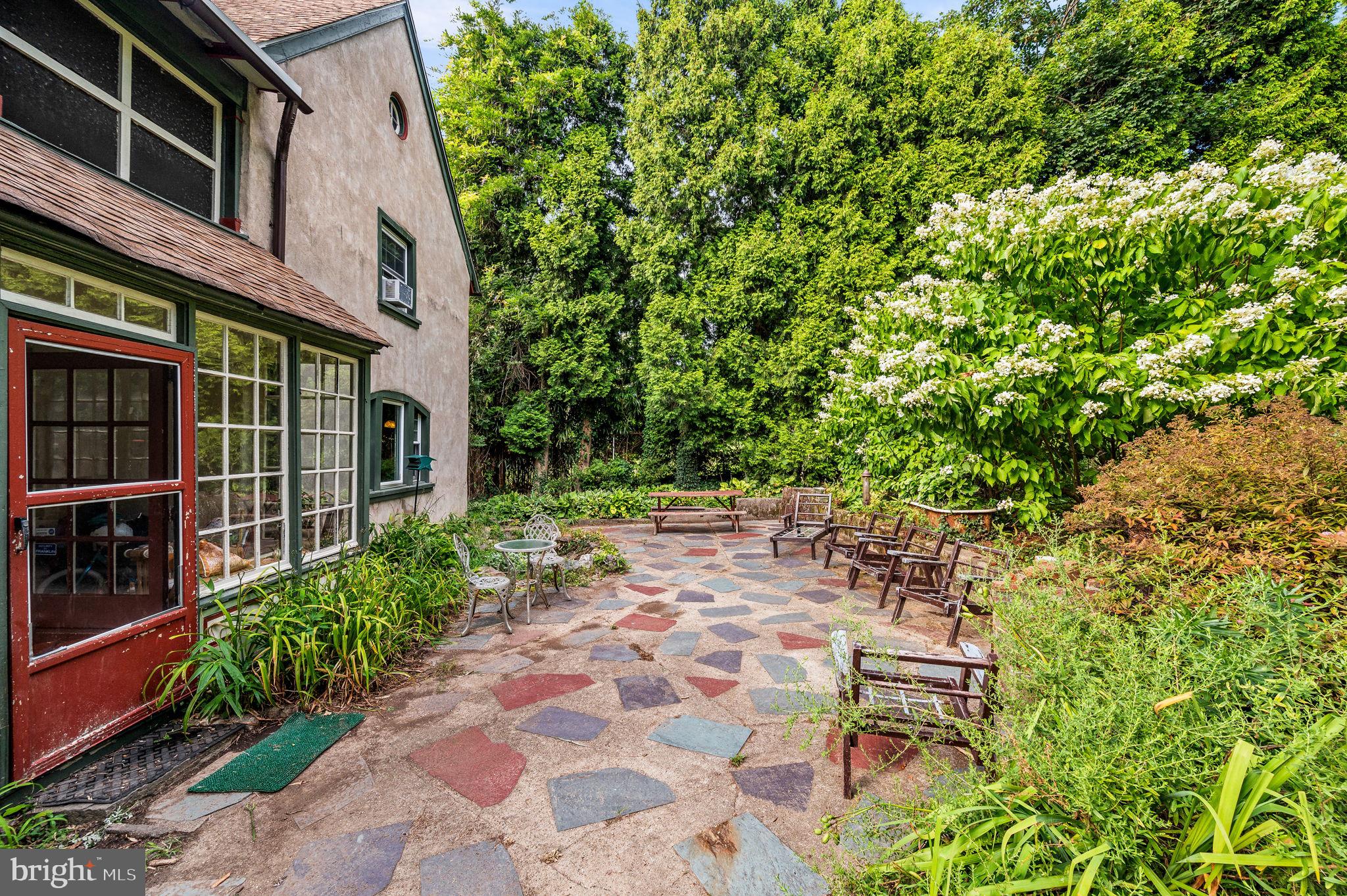 408 East Woodlawn Street Philadelphia, PA 19144 - Photo 26 of 31 a view of an chairs and table in the patio