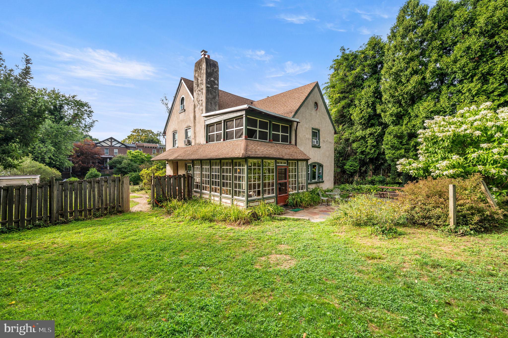 408 East Woodlawn Street Philadelphia, PA 19144 - Photo 3 of 31 a view of a house with a yard