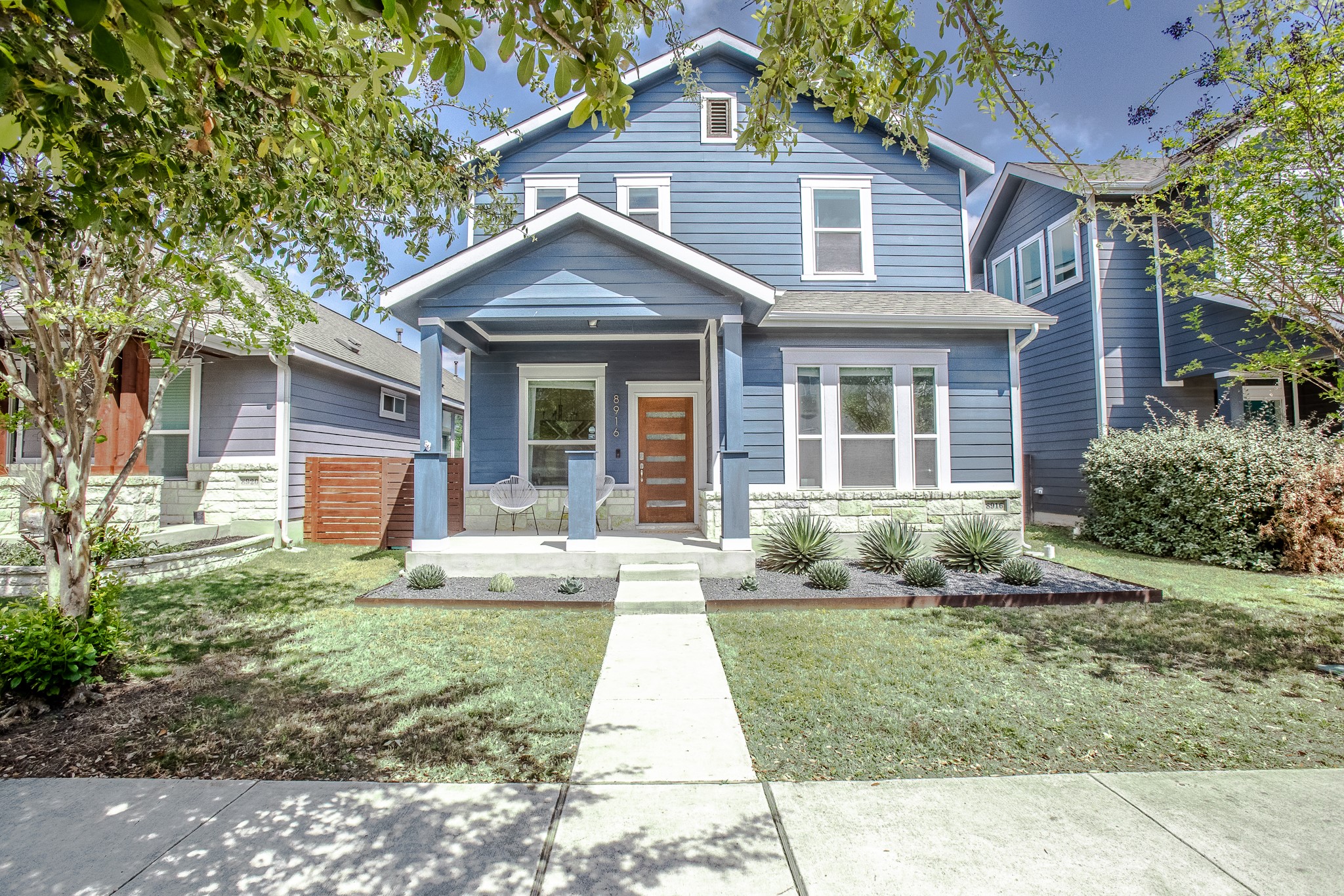 front view of a house and a yard