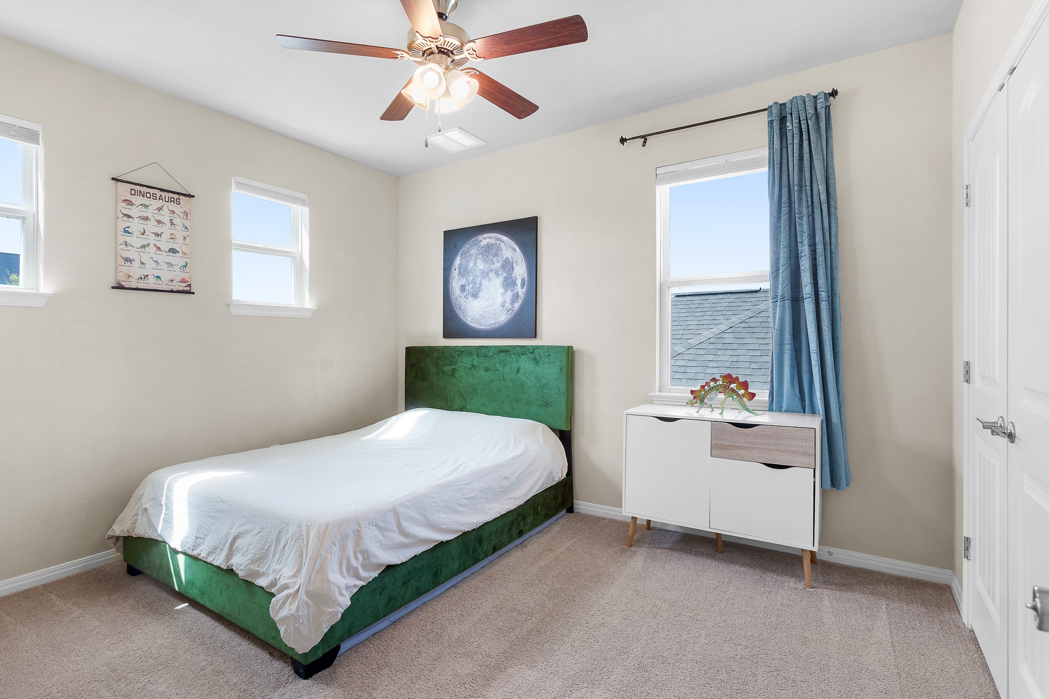 8916 Cattle Baron Path Austin, TX 78747 - Photo 24 of 37 a bedroom with a bed and a window