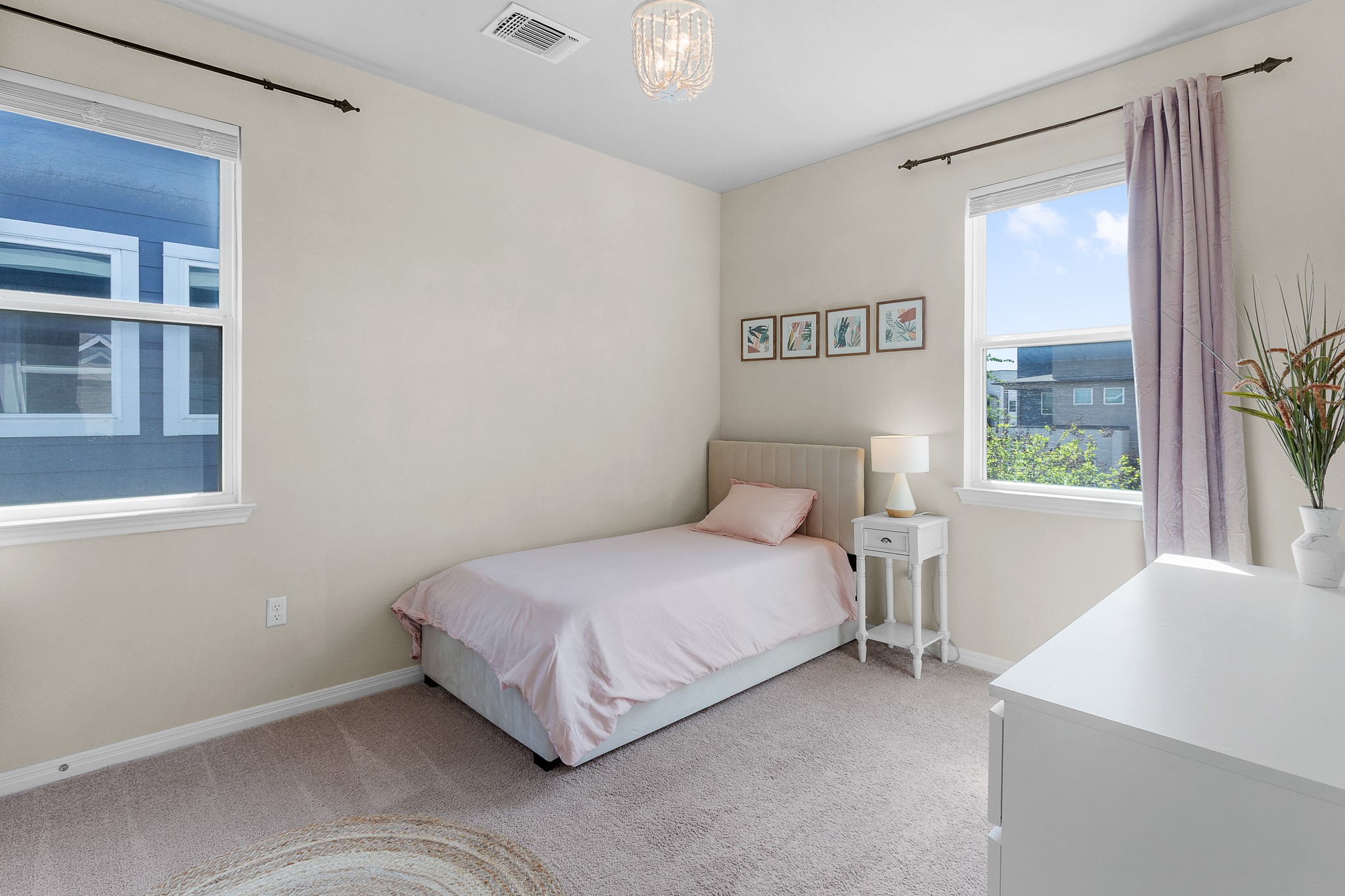 8916 Cattle Baron Path Austin, TX 78747 - Photo 26 of 37 a bedroom with a bed and a window